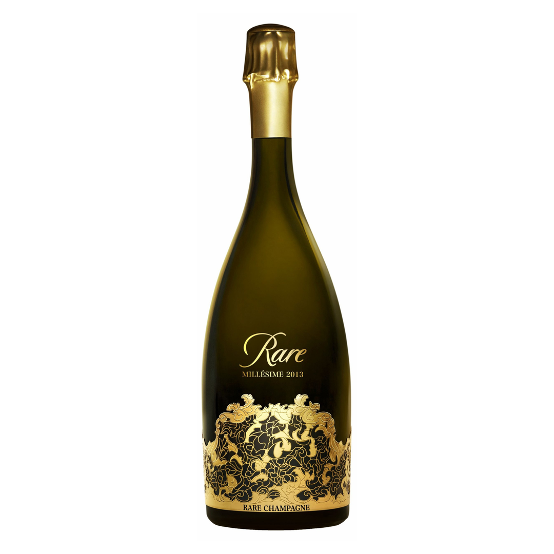 Bottle of Rare champagne with gold cap and decorative label on a white background