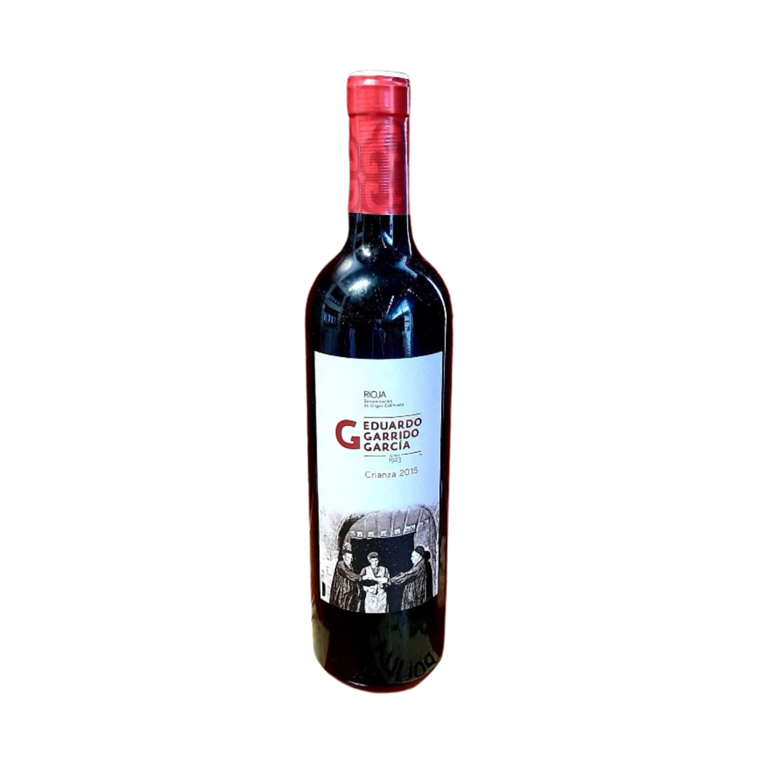 Red wine bottle with a visible label on a white background