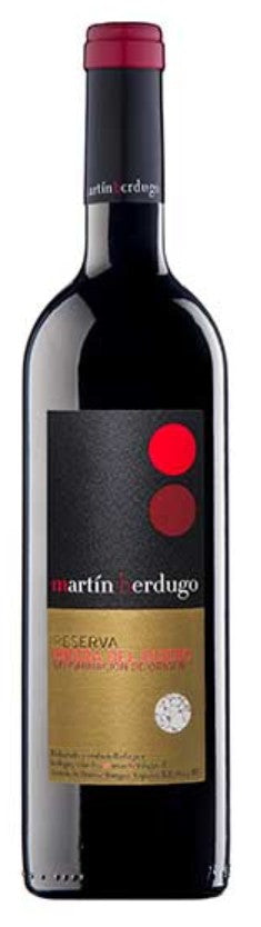 Bottle of Martin Erdugo Reserva wine with a red cap and label.