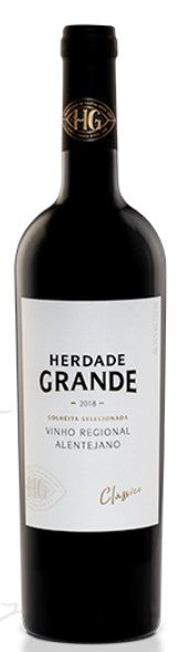 Herdade Grande wine bottle with label on a black background