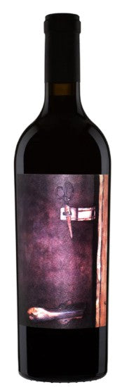 Red wine bottle with a label featuring an abstract design on a white background