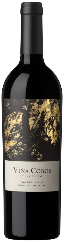 Red wine bottle with a black label featuring gold leaf design on a dark background
