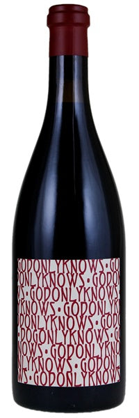 Wine bottle with a red label on a white background