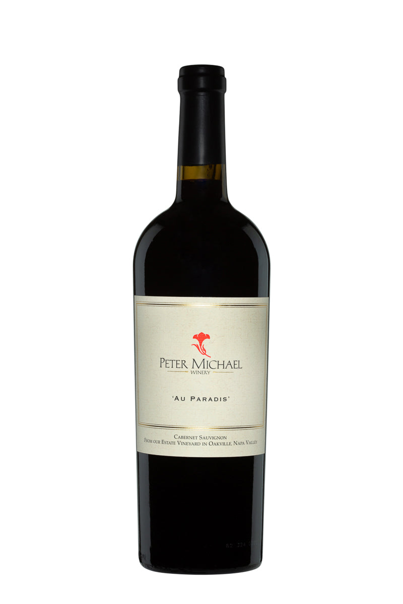 Wine bottle with 'Peter Michael' label on a white background