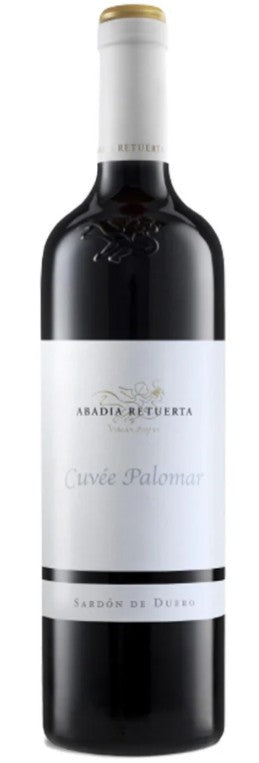 Red wine bottle with white label on a white background