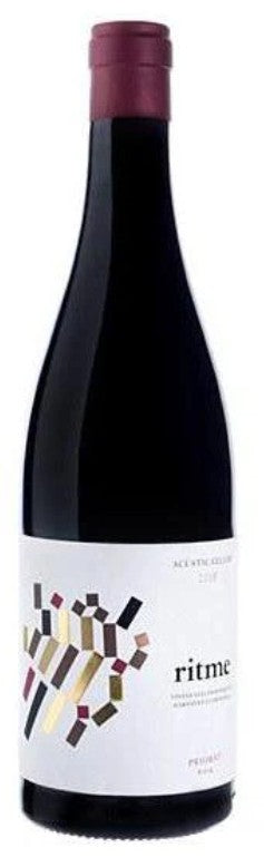 Wine bottle with a label featuring abstract designs and the brand 'ritme'.