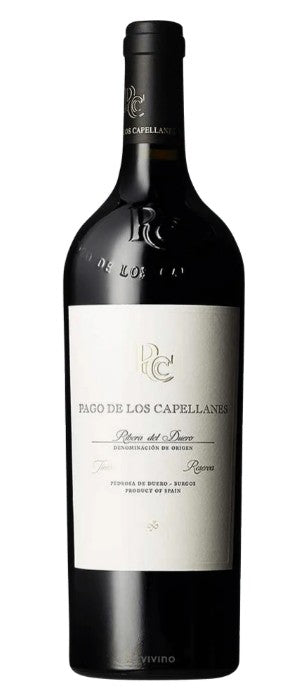 Bottle of Pago de los Capellanos wine on a white background