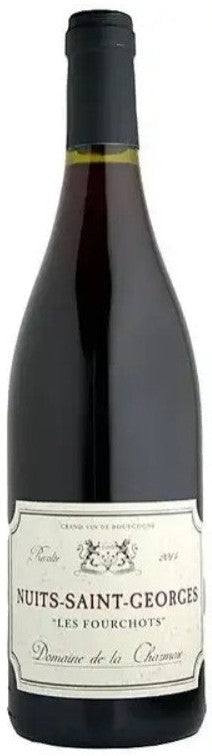 Bottle of Nuits-Saint-Georges wine with a visible label on a dark background