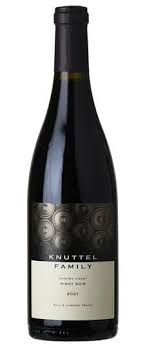 Wine bottle with 'Knutтел Family' label on a white background