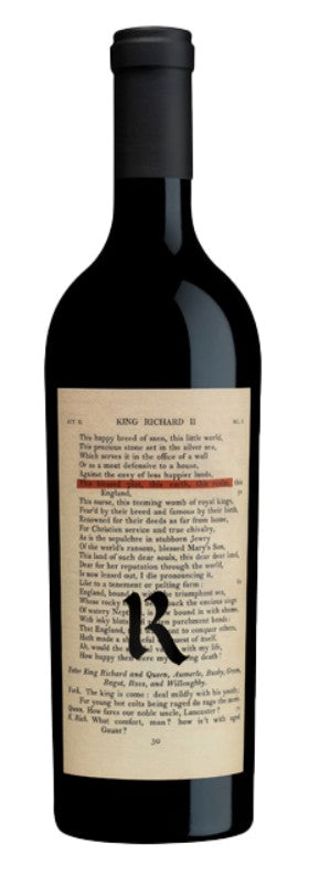 Red wine bottle with a detailed label on a white background