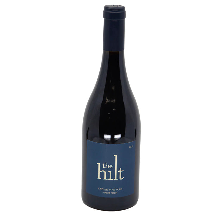 Wine bottle labeled 'the hilt' on a white background