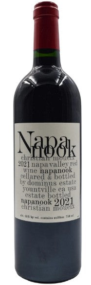 Red wine bottle with a label on a white background