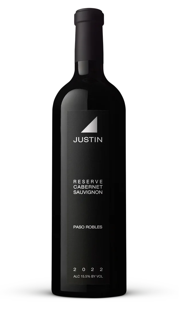 Black wine bottle with 'Justin Reserve Cabernet Sauvignon' label on a white background